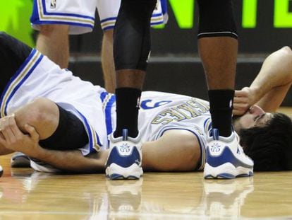 Ricky Rubio lies prostrate after his collision with Kobe Bryant during the Minnesota-Lakers game.