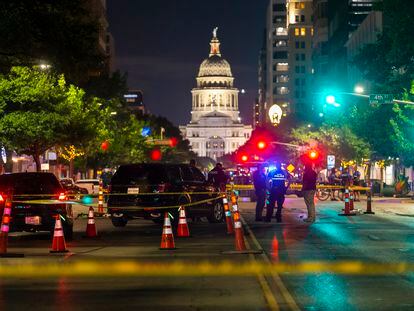 Austin police investigate the homicide shooting that occurred at a demonstration against police violence in downtown Austin, Texas, July 25, 2020.