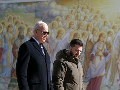 US President Joe Biden, left, walks with Ukrainian President Volodymyr Zelenskiy at St. Michaels Golden-Domed Cathedral during an unannounced visit, in Kyiv, Ukraine, Monday, Feb. 20, 2023.