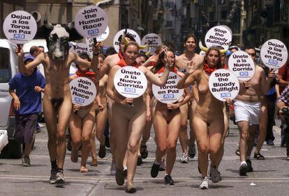 Activists from animal-rights group PETA run naked through the streets of Pamplona in 2002, in protest against the mistreatment of animals in bullfighting.