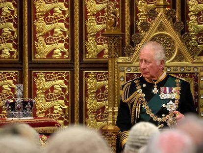 Charles III, then Prince of Wales, focuses on the Imperial Crown during the opening of Parliament on May 10, 2022.