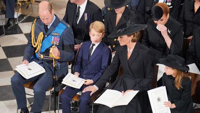 The Prince and Princess of Wales with two of their children, Prince George and Princess Charlotte, on September 19, 2022, at the funeral of Elizabeth II.