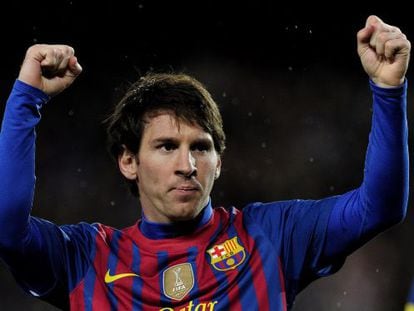 Lionel Messi celebrates one of his goals against Granada.