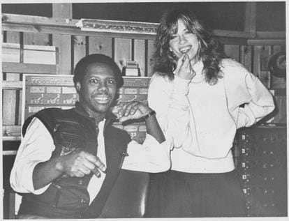 Nile Rodgers and Carly Simon. He wrote the song 'Why' for her. 