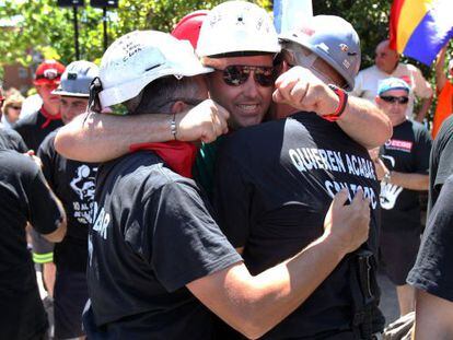 Jubilant miners arrive in Alcobendas, to the north of the capital, on Monday.