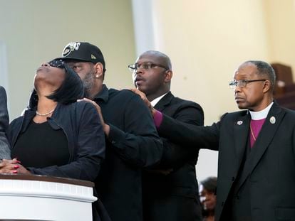 RowVaugn Wells, left, mother of Tyre Nichols, who died after being beaten by Memphis police officers, cries as she is comforted by Tyre's stepfather Rodney Wells, behind her, at a news conference with civil rights Attorney Ben Crump, in Memphis, Tenn., Monday, Jan. 23, 2023.