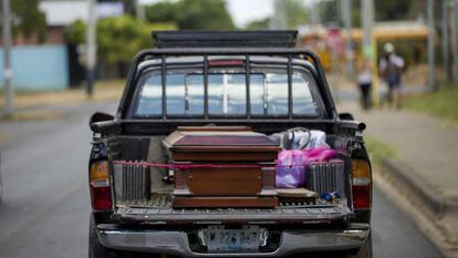 The body of Vilma Trujillo is driven home for burial.