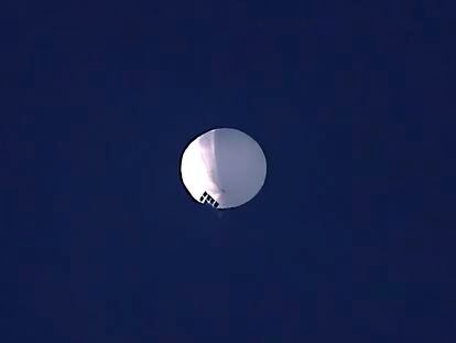 A high altitude balloon floats over Billings, Mont., on Wednesday, Feb. 1, 2023.