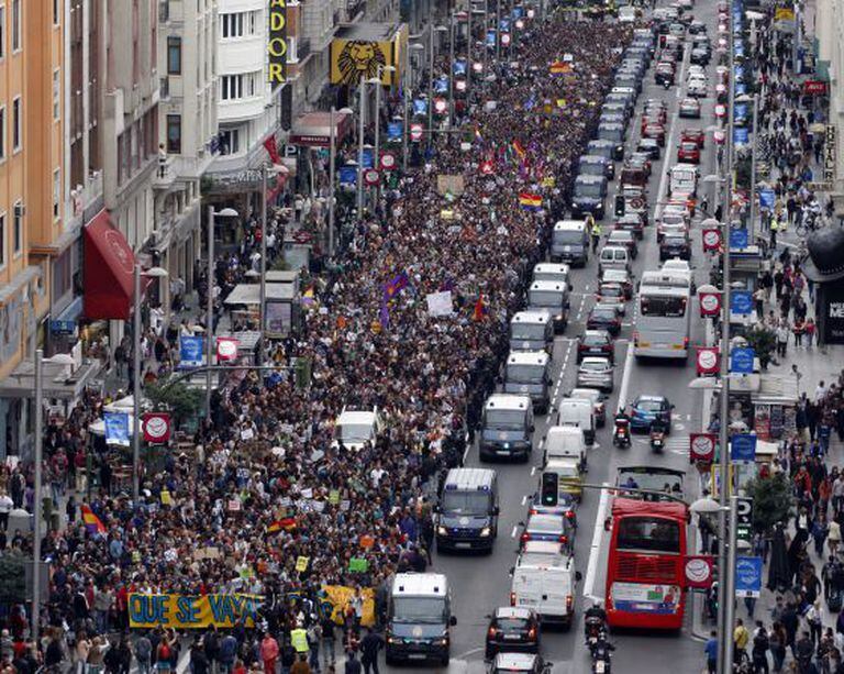Protestors on a recent march make their way through Madrid.