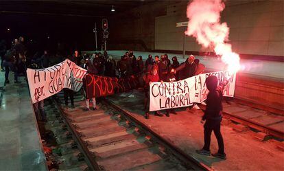 Protesters block the train line at Terrassa station on Friday.