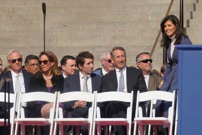 Former South Carolina Gov. Nikki Haley, right, takes her seat next to former Gov. Mark Sanford at the second inaugural of Gov. Henry McMaster on Wednesday, Jan. 11, 2023, in Columbia, S.C.