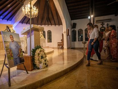 Friends of Edwin attend a service in his memory in Montería (Colombia), on August 10.