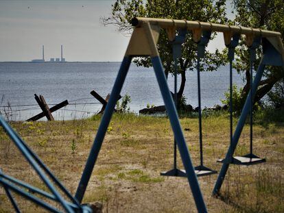 The Zaporizhzhia nuclear power plant, as seen on the far side of the Dnipro River from Ostriv, has been under Moscow's control since March 2022.