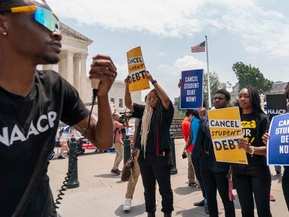 Students protest for student debt forgiveness, Friday, June 30, 2023, outside the Supreme Court in Washington.