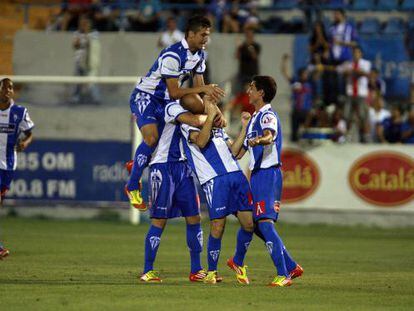 Alcoyano&#039;s players celebrate a goal on their way to victory over Tenerife and a match against Real Madrid.  