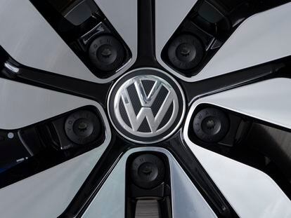 An e-Golf electric car with the VW logo on a rim is pictured in the German car manufacturer Volkswagen Transparent Factory in Dresden, eastern Germany, in April 2017.