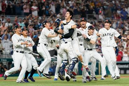 Japan player Shohei Ohtani celebrates with his teammates after defeating the United States in World Baseball Classic championship game, on March 21, 2023, in Miami.