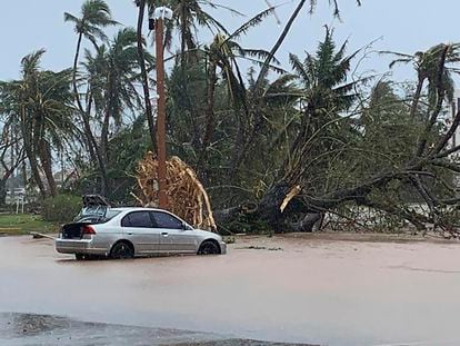 The waters of the Hagatna River overflows its banks and encroaches into the Bank of Guam parking lot in Hagatna, Guam, Thursday, May 25, 2023, in the aftermath of Typhoon Mawar.
