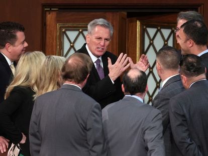 Kevin McCarthy speaks to some members of the House of Representatives in the Capitol Building, on Wednesday, January 4.
