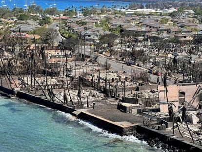 The shells of burned houses and buildings are left after wildfires driven by high winds burned across most of the town in Lahaina, Maui, Hawaii, on August 11, 2023.
