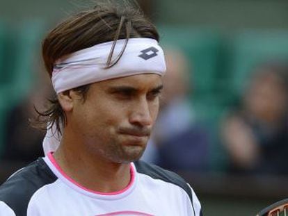 Spain's David Ferrer reacts after beating Spain's Marcel Granollers during their Men's Singles 4th Round tennis match of the French Open.