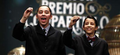 Two students from San Ildefonso school singing out numbers at the 2014 Christmas lottery draw.
