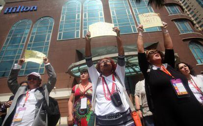 Several women protest last month over the court&#039;s decision outside a Santo Domingo hotel where a regional women&#039;s conference took place. 