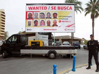 A billboard showing those wanted for arrest in Costa del Sol.