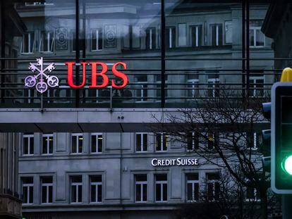 Signs for the Swiss banks Credit Suisse and UBS in Zurich on March 19, 2023.