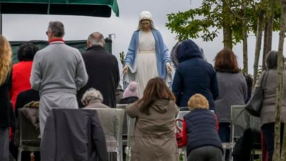 The followers of the psychic Gisella Cardia take part in prayer, while kneeling before the Virgin in Trevignano Romano, a town in the Metropolitan City of Rome.