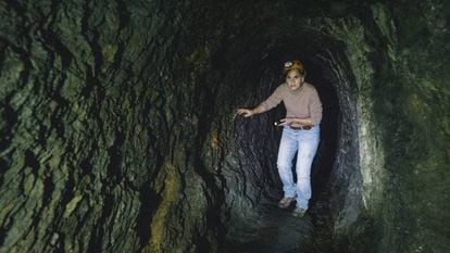 Mertxe Urteaga inside a tunnel made by the Romans under Peñas de Aya in Spain's Basque Country.