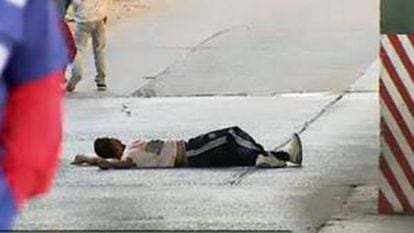 A 27-year-old man lays injured after he was thrown off a bridge on Wednesday.
