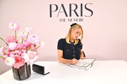 Paris Hilton signing her memoir