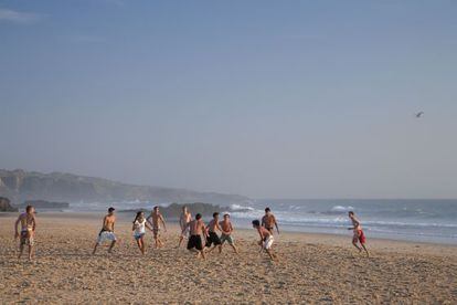 A soccer game on Malhao beach, in the Alentejo region.