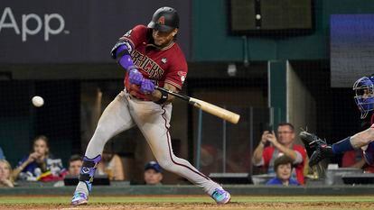 Arizona Diamondbacks second baseman Ketel Marte hits a RBI double during the fifth inning in game one of the 2023 World Series against the Texas Rangers at Globe Life Field.