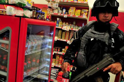 A soldier inside a store in Guerrero state.