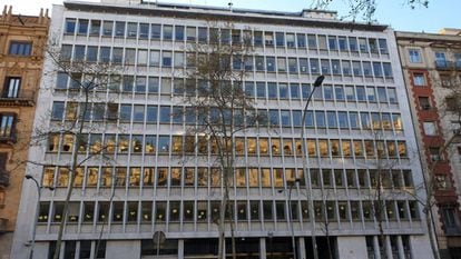 The Catalan agriculture department with yellow cut-out figures on the windows.