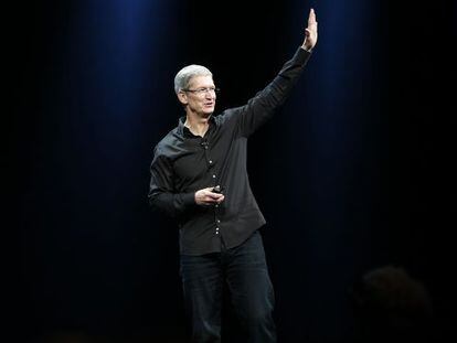 Apple Inc. CEO Tim Cook waves to the crowd during the Apple Worldwide Developers Conference (WWDC) in June.