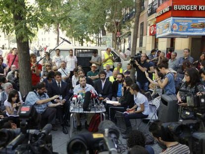 Members of Spain&#039;s &quot;Indignados&quot; movement hold a news conference after filing a lawsuit against Bankia bank in Madrid.