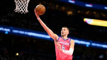 Washington Wizards center Kristaps Porzingis (6) goes to the basket during the first half of an NBA basketball game against the Boston Celtics, Tuesday, March 28, 2023, in Washington.