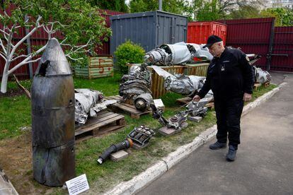 Oleksandr Ruvin, director of Ukraine's Forensic and Scientific Research Institute, displays remains of a Russian hypersonic missile (Kh-47 Kinzhal) on May 12, 2023.