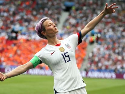 In this July 7, 2019 file photo, United States' Megan Rapinoe celebrates after scoring the opening goal from the penalty spot during the Women's World Cup final soccer match against The Netherlands at the Stade de Lyon in Decines, outside Lyon, France.