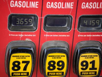 The prices of the various grades of gasoline available are displayed electronically on a pump at a filling station on Sept. 18, 2023, in Newcastle, Wyo.