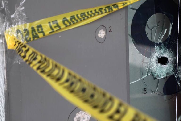 Bullet holes left after a gunman opened fire in a bar in Culiacán.