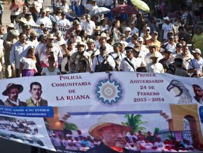 Self-defense groups march in La Ruana on February 24 to mark the movement's first anniversary.
