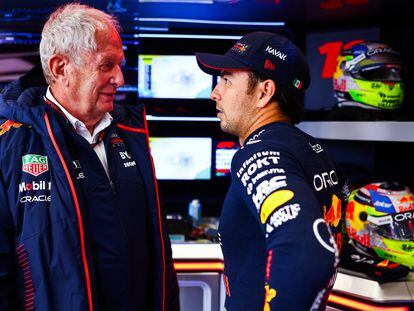 Sergio Pérez talks with Helmut Marko, Red Bull advisor, during the Dutch Grand Prix in August.