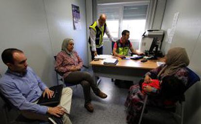 A Syrian woman requests asylum in the Spanish offices at the border of Melilla and Morocco.