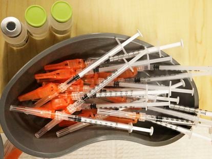 Pre-loaded syringes with COVID-19 vaccine are ready for use in New Orleans, on Jan. 25, 2022.