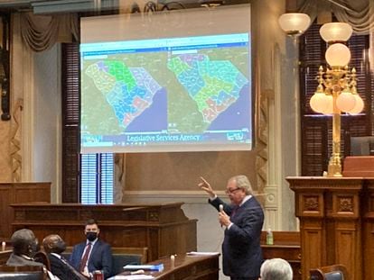 State Sen. Dick Harpootlian, D-Columbia, compares his proposed map of US House districts drawn with 2020 US Census data to a plan supported by Republicans on Jan. 20, 2022, in Columbia, S.C.