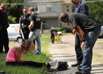 Police and paramedics attend a woman suffering from an overdose in Hamilton County.